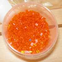 pot de grains en plastique orange à faire fondre