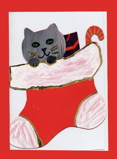 petit chat dans une botte de Noël