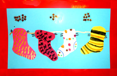 carte de Noël avec des chaussettes décorées