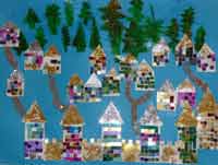 village avec maisons en mosaïques et sapins