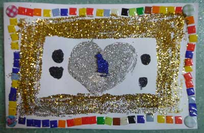 carte fâte des mères ou pères avec des paillettes et des mosaiques